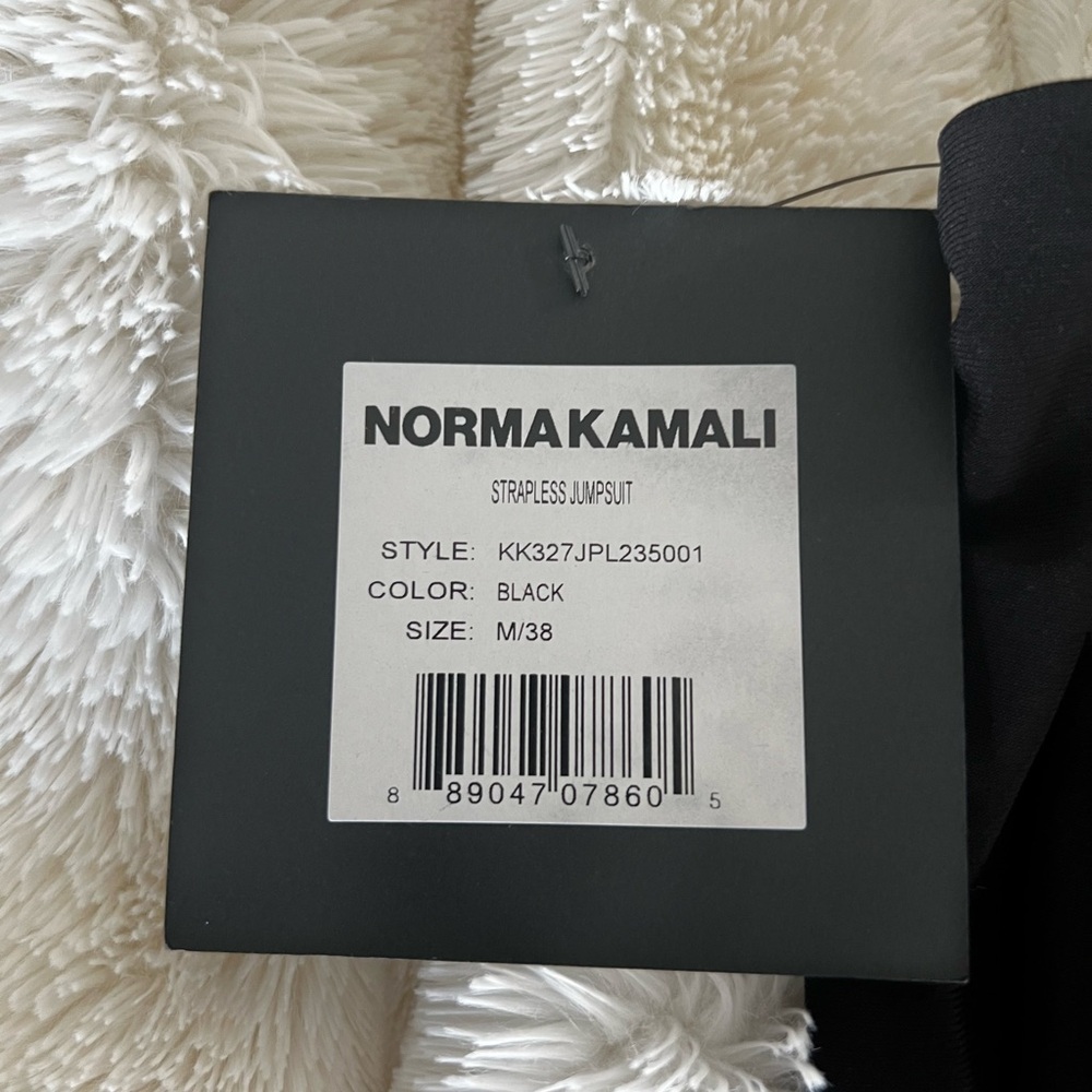Norma Kamali, strapless, wide legged, jumpsuit NEVER worn. Brand new with tags